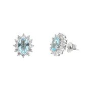 Earrings in 925 Silver with white zircons and central water zircon