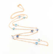 Long chain necklace in 925 silver with light points scattered with crystals in shades of blue