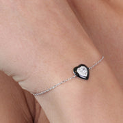 Bracciale in Argento 925 con cuore centrale impreziosito da zircone bianco e smalto nero