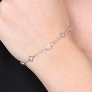 Bracciale in Argento 925 con cuori traforati e cristalli bianchi alternati