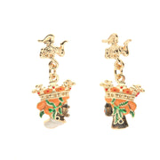 Metal earrings with Trinacria symbol and dark brown heads embellished with colored enamels