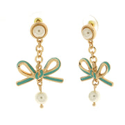 Metal earrings with pearls and central bow