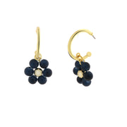 Circle metal earrings with blue flower