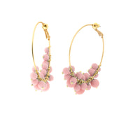 Circle metal earrings with pink stones