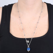 Collana in Metallo con campanella portafortuna pendente, impreziosita da smalto blu e cristalli