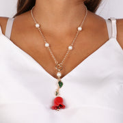 Collana in Metallo con chiusura a T e campanella pendente a forma di rosa rossa e foglie