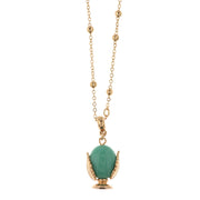 Metal necklace with aqua green enamelled lucky pumo