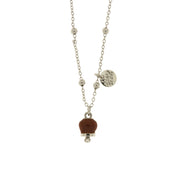 Metal necklace with brown enamel bell