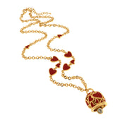 Metal necklace with lucky bell embellished with red hearts