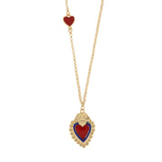 Metal necklace with blue and red sacred heart