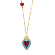 Metal necklace with blue and red sacred heart