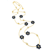 Metal necklace with blue flower-shaped stones