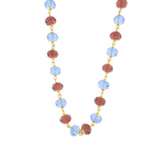 Metal necklace with blue and red crystals