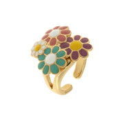 Metal ring with colored daisies