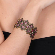 Bracciale in Metallo elastico, con fiori e cristalli rosa