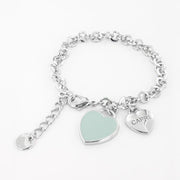 Bracciale in Metallo con cuore pendente in smalto verde