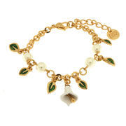 Metal bracelet with white pearls, calla-shaped bell and leaves embellished with colored enamels