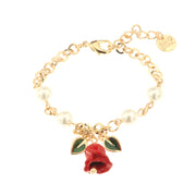 Metal bracelet with pearls, leaves and rose-shaped bell embellished with colored enamels