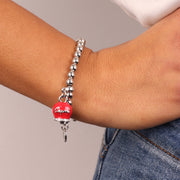 Bracciale in Metallo maglia a sfere con campanella rossa con scritta Capri e cristalli bianchi