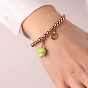 Bracciale in Metallo con campanella portafortuna verde lime, con scritta Capri