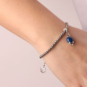 Bracciale in Metallo maglia a sfere con campanella portafortuna pendente blu impreziosita da cristalli