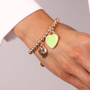 Bracciale in Metallo con cuore pendente in smalto verde e scritta Capri