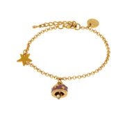 Metal bracelet with purple enamel bell embellished with stars and sun