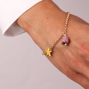 Bracciale in Metallo con campanella in smalto viola impreziosita da stelle e sole