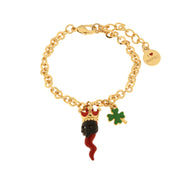 Metal bracelet with red enamel lucky horn and green four-leaf clover