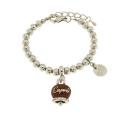 Metal bracelet with capri written bell pendant embellished with crystals and brown enamel