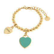 Metal bracelet with green heart