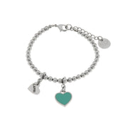 Metal bracelet with turquoise heart