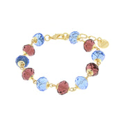 Metal bracelet with blue and red crystals