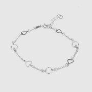 Bracciale in Argento 925 con cuori traforati e cristalli bianchi alternati